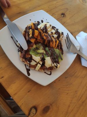 Vegan waffle with vegan chocolate and fruits at Gud  in Arequipa