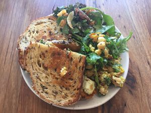 Pumpkin, hummus, rocket and dukkah toastie with two salads (cauliflower salad and sweet potato salad) at Small Graces in Footscray
