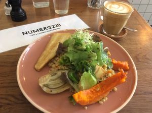 Risotto à l’orge et légumes grillés, café au lait d’avoine. at Numero 220 in Paris