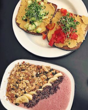 Hummus toast and Ceri Berry smoothie bowl at Eight - The Health Lounge in Lisbon