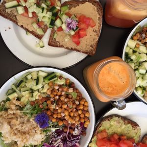 salad with rice and chickpeas, toast with hummus and avocado, juice at Eight - The Health Lounge in Lisbon
