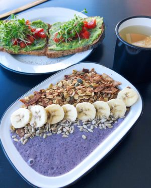 Berry muffin breakfast bowl and avocado toast at Eight - The Health Lounge in Lisbon