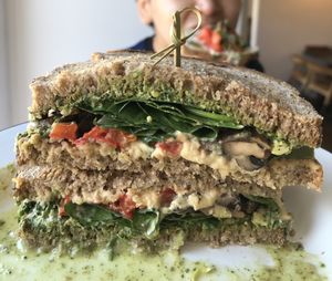 Hummus, pesto, mushroom, tomato, spinach, housemade Vegan bread at Eight - The Health Lounge in Lisbon