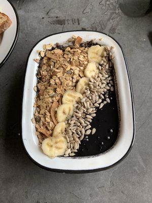 Black diamond smoothie bowl: coconut milk, banana, blueberry, activated charcoal at Eight - The Health Lounge in Lisbon