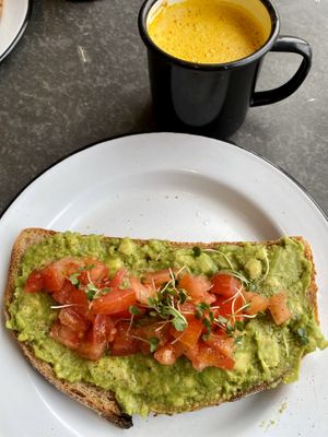 Avocado sandwich. To drink turmeric latte!  at Eight - The Health Lounge in Lisbon