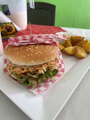 Burger with v patty changed to plant based chicken   at Viva Mejor in Tulua