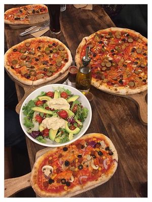 different size pizzas and salad at Basement Browns in Coventry