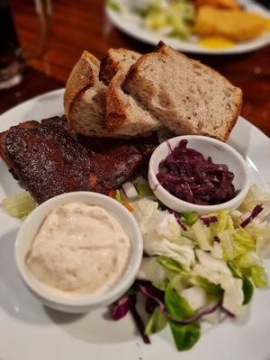 Seitan and black beans ribs, veg mayo, onion and bread at Střecha in Prague