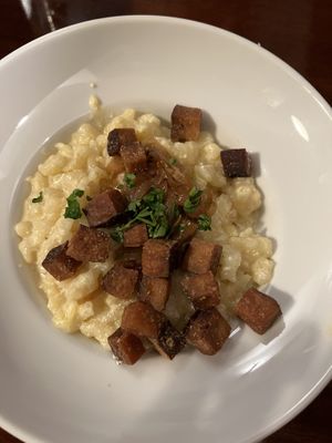 Halušky (a type of noodle) with vegan cheese and smoked tofu  at Střecha in Prague