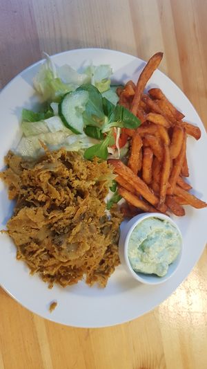 Kepab with sweet potato fries, salad and herb dip at Střecha in Prague