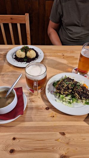Dumpling on cabbage and potatoes with beans at Střecha in Prague