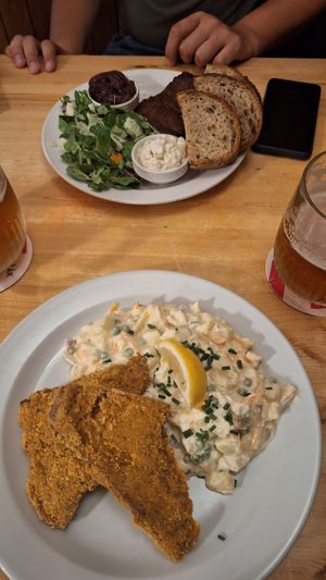 Ribs with salad and schnitzel with potato salad at Střecha in Prague