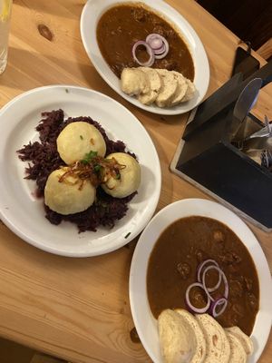 filled dumplings on red cabbage and goulash  at Střecha in Prague