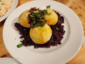 Dumplings over red cabbage at Střecha in Prague