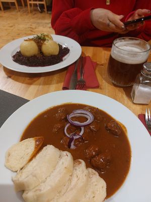 Goulash and dumpling on red cabbage at Střecha in Prague