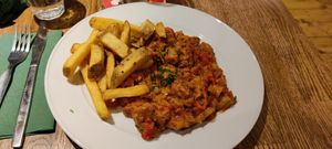 Spicy vegan meat with vegetables at Střecha in Prague