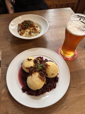 Knedlíky (front), halušky, and IPA  at Střecha in Prague