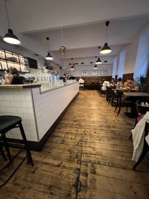 Pretty space but it is loud and echoes; it needs curtains and soft surfaces affixed to walls to improve the acoustics  at Střecha in Prague