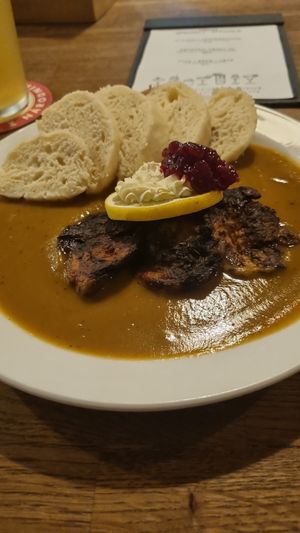 Soy sirloin, veggie sauce and bread at Střecha in Prague