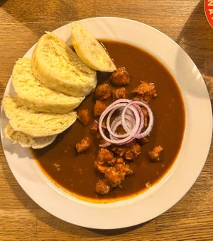 Bodvar goulash with traditional dumplings at Střecha in Prague