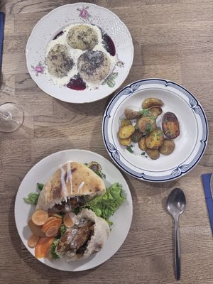 Chicken pita, potatoes, and plum dumplings!  at Střecha in Prague