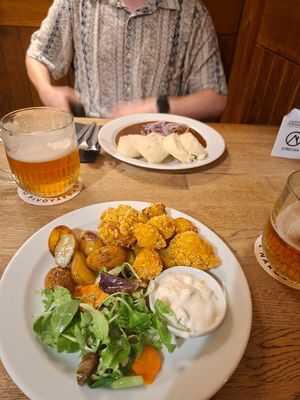 Fried cauliflower and vegan goulash. at Střecha in Prague