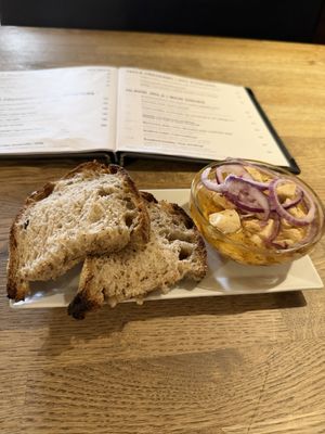 Tofu pickled in oil with bread  at Střecha in Prague