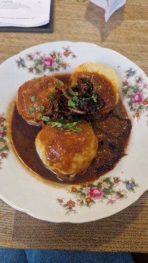 Dumplings with red cabbage and gravy at Střecha in Prague