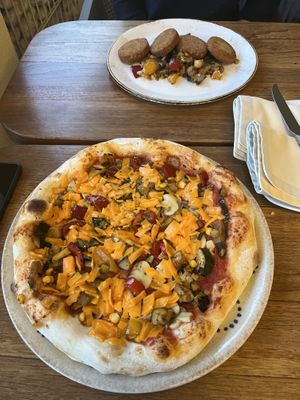 Pizza with vegan cheese.  at Hotel Opara in Trebnje
