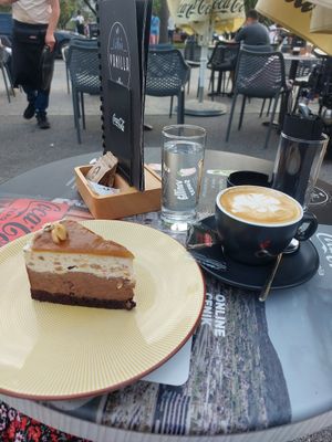 Snickers cake and cappuccino with almond milk at Cajnica Vanilla in Koper