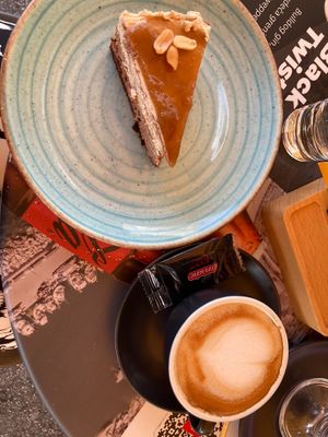 Oatmilk Coffee & Snickers Cake  at Cajnica Vanilla in Koper