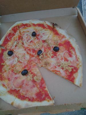 vegan tuna and onion pizza with olives. not a high quality pic but would highly recommend. and ask for extra vegan tuna, this was a scarce amount in my opinion at Spizzico - Pizza Time in Bolzano