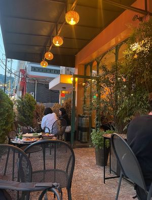 Outside. Cozy with trees and warm light  at Morococo Cafe - 모로코코 카페 in Seoul