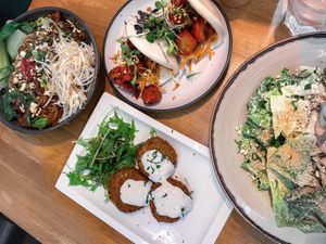 Pad Thai, BBQ ‘pork’ Bao Buns, Artichoke ‘Crab’ Cakes and a Caesar Salad.  at The Butcher's Son in Auckland
