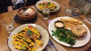 Nachos, “chicken” burger and “cacao pow” smoothie bowl at The Butcher's Son in Auckland
