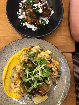 Cauliflower Steaks w caper, lemon, gherkin and almond salsa.  at The Butcher's Son in Auckland
