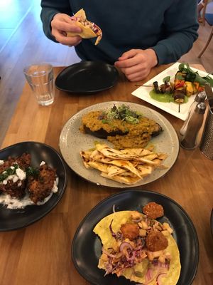 Kebabs, fritters, egg plant and tacos. at The Butcher's Son in Auckland
