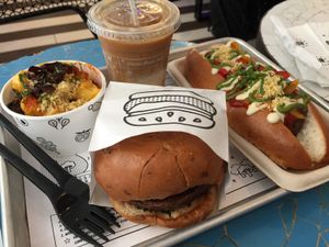 Iced latte, Mac and cheese, beet burger & meat ball sub  at By Chloe - Covent Garden in London