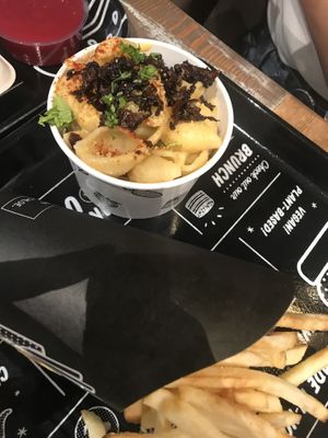 Mac and cheese with “bacon” bits  at By Chloe - Covent Garden in London