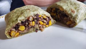 Burrito with cashew cheeze ($8). Wholesome and tasty. at Raw Deal in Menomonie