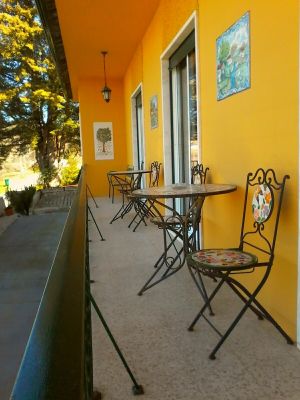Balcony from the bedrooms. Beautiful views of the countryside.  Watch the world go by in the shade. at Casa Das Flores in Tomar