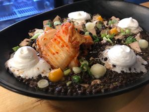 Beluga lentil and tofu with coco cream sesame and kimchee at Brasserie du Bas-Canada in Gatineau