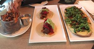 Sweet potato fries with house made vegan ranch, buffalo cauliflower tacos, flat bread happy hour menu items  at Generations Bistro & Bar in Greer