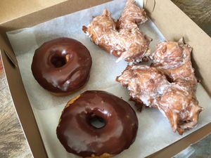 Vegan chocolate yeasted donuts & vegan pear fritters.  at Johnny Doughnuts in San Francisco