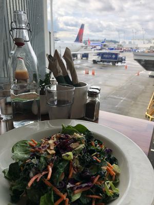 Superfood salad and an outside view at SEA - Floret in Seattle