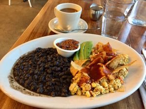 Floret’s Vegan Chilaquiles and coffee. at SEA - Floret in Seattle