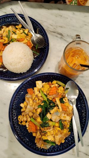 We chose rice with tofu and cashew and Pad See 
Everything was delicious!!! Happy I found this place :) at Home Cafe Tha Tian in Bangkok