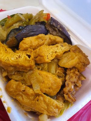 $4 
Brown Rice , curry tau pok, tempeh beancurd, eggplant & bitter gourd ~ 17/7/21 at Toa Payoh Lorong 8 - Vegetarian Stall in Central Singapore