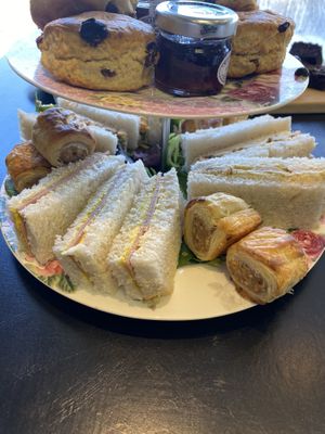 Ham and mustard sandwiches and sausage rolls (afternoon tea)  at Baskerville's Coffee House in Maidstone