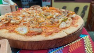 Vegetable pizza without cheese  at Global Village Kafe in Lovina